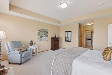 Spacious two-bedroom, two bathroom condo has walls of windows in on The Chaska Par 30 Golf Course in Minnesota - for sale on GolfHomes.com, golf home, golf lot