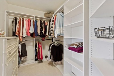 Spacious two-bedroom, two bathroom condo has walls of windows in on The Chaska Par 30 Golf Course in Minnesota - for sale on GolfHomes.com, golf home, golf lot