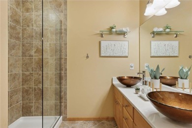 Spacious two-bedroom, two bathroom condo has walls of windows in on The Chaska Par 30 Golf Course in Minnesota - for sale on GolfHomes.com, golf home, golf lot