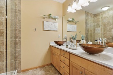 Spacious two-bedroom, two bathroom condo has walls of windows in on The Chaska Par 30 Golf Course in Minnesota - for sale on GolfHomes.com, golf home, golf lot
