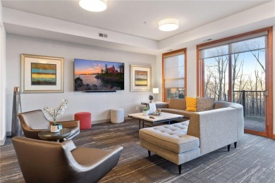 Spacious two-bedroom, two bathroom condo has walls of windows in on The Chaska Par 30 Golf Course in Minnesota - for sale on GolfHomes.com, golf home, golf lot