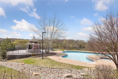 Spacious two-bedroom, two bathroom condo has walls of windows in on The Chaska Par 30 Golf Course in Minnesota - for sale on GolfHomes.com, golf home, golf lot