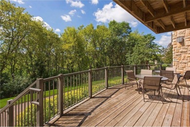 Spacious two-bedroom, two bathroom condo has walls of windows in on The Chaska Par 30 Golf Course in Minnesota - for sale on GolfHomes.com, golf home, golf lot
