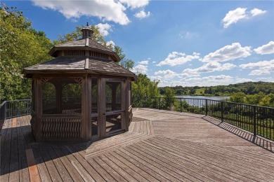 Spacious two-bedroom, two bathroom condo has walls of windows in on The Chaska Par 30 Golf Course in Minnesota - for sale on GolfHomes.com, golf home, golf lot