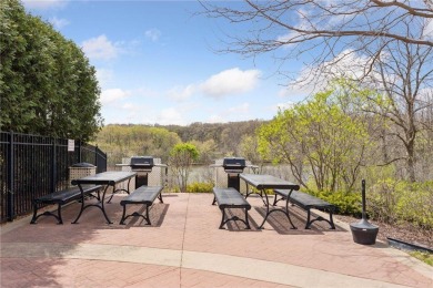 Spacious two-bedroom, two bathroom condo has walls of windows in on The Chaska Par 30 Golf Course in Minnesota - for sale on GolfHomes.com, golf home, golf lot
