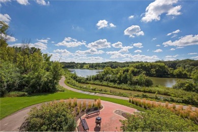 Spacious two-bedroom, two bathroom condo has walls of windows in on The Chaska Par 30 Golf Course in Minnesota - for sale on GolfHomes.com, golf home, golf lot