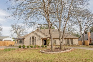 This beautifully updated home strikes that perfect balance on Hide-A-Way Lake Golf Course in Texas - for sale on GolfHomes.com, golf home, golf lot