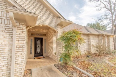 This beautifully updated home strikes that perfect balance on Hide-A-Way Lake Golf Course in Texas - for sale on GolfHomes.com, golf home, golf lot