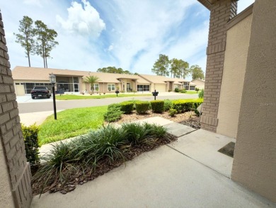 Welcome to this desirable end-unit villa in the vibrant 55+ golf on Heritage Pines Country Club in Florida - for sale on GolfHomes.com, golf home, golf lot
