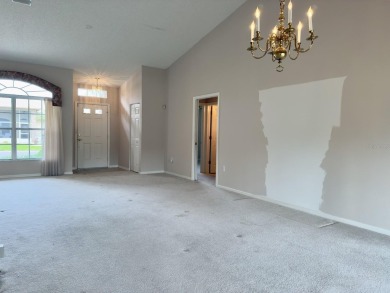 Welcome to this desirable end-unit villa in the vibrant 55+ golf on Heritage Pines Country Club in Florida - for sale on GolfHomes.com, golf home, golf lot