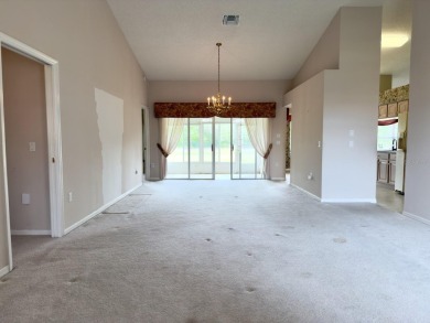 Welcome to this desirable end-unit villa in the vibrant 55+ golf on Heritage Pines Country Club in Florida - for sale on GolfHomes.com, golf home, golf lot