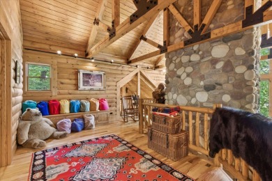 Exquisite Lakefront Log Cabin in Hideaway Hills - A Rare Find on on Hide-A-Way Hills Golf Club in Ohio - for sale on GolfHomes.com, golf home, golf lot