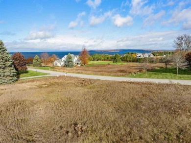 Immerse yourself in breathtaking, panoramic views of Lake on Crooked Tree Golf Club in Michigan - for sale on GolfHomes.com, golf home, golf lot