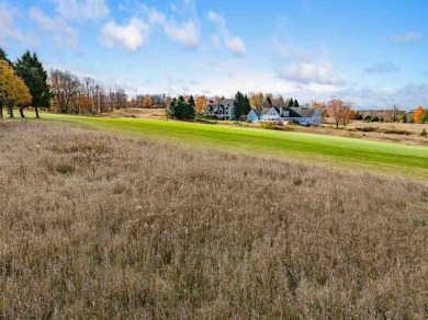 Immerse yourself in breathtaking, panoramic views of Lake on Crooked Tree Golf Club in Michigan - for sale on GolfHomes.com, golf home, golf lot