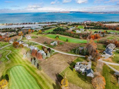 Immerse yourself in breathtaking, panoramic views of Lake on Crooked Tree Golf Club in Michigan - for sale on GolfHomes.com, golf home, golf lot