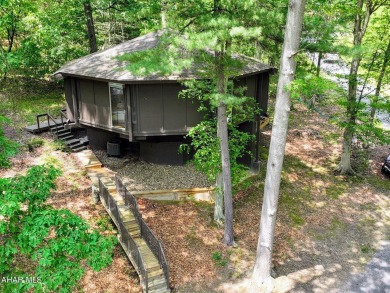 Everyone loves these Unique Homes, this one has you feeling like on Bedford Springs Golf Course in Pennsylvania - for sale on GolfHomes.com, golf home, golf lot