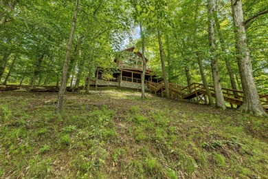 Exquisite Lakefront Log Cabin in Hideaway Hills - A Rare Find on on Hide-A-Way Hills Golf Club in Ohio - for sale on GolfHomes.com, golf home, golf lot