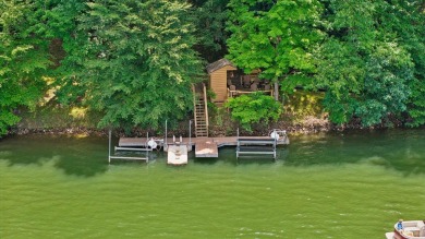 Exquisite Lakefront Log Cabin in Hideaway Hills - A Rare Find on on Hide-A-Way Hills Golf Club in Ohio - for sale on GolfHomes.com, golf home, golf lot