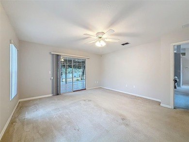 Under contract-accepting backup offers. Lovely stucco 3 on Eagle Ridge At Spruce Creek Country Club in Florida - for sale on GolfHomes.com, golf home, golf lot