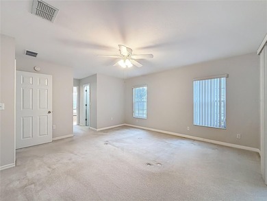 Under contract-accepting backup offers. Lovely stucco 3 on Eagle Ridge At Spruce Creek Country Club in Florida - for sale on GolfHomes.com, golf home, golf lot