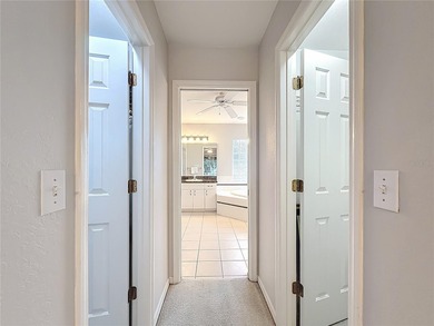 Under contract-accepting backup offers. Lovely stucco 3 on Eagle Ridge At Spruce Creek Country Club in Florida - for sale on GolfHomes.com, golf home, golf lot