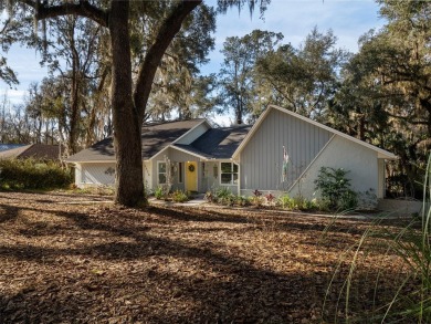 Situated on a large lot in the iconic Gainesville Country Club on Gainesville Golf and Country Club in Florida - for sale on GolfHomes.com, golf home, golf lot