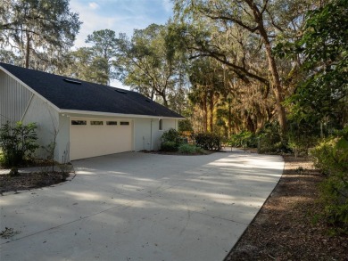 Situated on a large lot in the iconic Gainesville Country Club on Gainesville Golf and Country Club in Florida - for sale on GolfHomes.com, golf home, golf lot