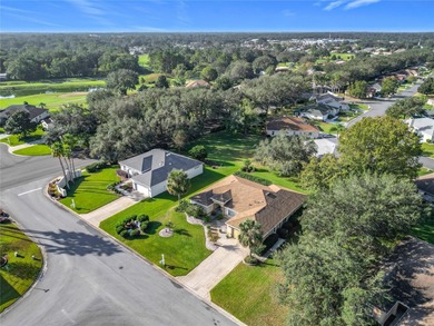 Under contract-accepting backup offers. Lovely stucco 3 on Eagle Ridge At Spruce Creek Country Club in Florida - for sale on GolfHomes.com, golf home, golf lot