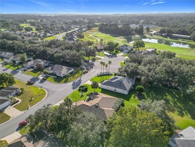Under contract-accepting backup offers. Lovely stucco 3 on Eagle Ridge At Spruce Creek Country Club in Florida - for sale on GolfHomes.com, golf home, golf lot