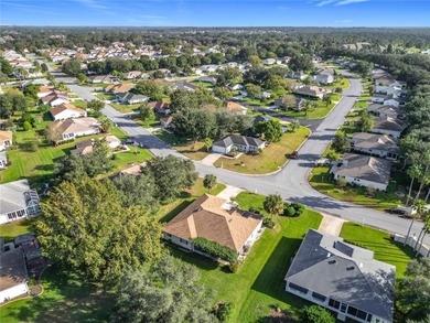 Under contract-accepting backup offers. Lovely stucco 3 on Eagle Ridge At Spruce Creek Country Club in Florida - for sale on GolfHomes.com, golf home, golf lot