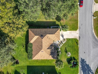 Under contract-accepting backup offers. Lovely stucco 3 on Eagle Ridge At Spruce Creek Country Club in Florida - for sale on GolfHomes.com, golf home, golf lot