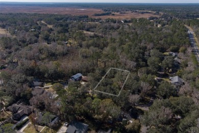 Situated on a large lot in the iconic Gainesville Country Club on Gainesville Golf and Country Club in Florida - for sale on GolfHomes.com, golf home, golf lot