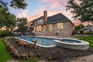 STUNNING GOLF COURSE ESTATE IN LANTANA! Nestled on a premium on Lantana Golf Club in Texas - for sale on GolfHomes.com, golf home, golf lot