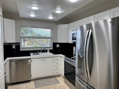 Beautiful and spacious 2BR/2Bath condo, larger than the standard on Sunrise Lakes Phase III in Florida - for sale on GolfHomes.com, golf home, golf lot