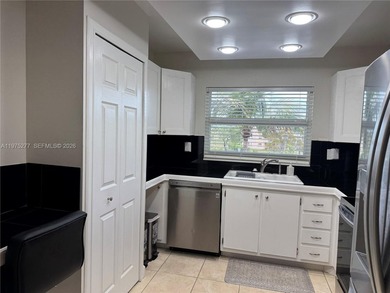 Beautiful and spacious 2BR/2Bath condo, larger than the standard on Sunrise Lakes Phase III in Florida - for sale on GolfHomes.com, golf home, golf lot