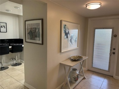 Beautiful and spacious 2BR/2Bath condo, larger than the standard on Sunrise Lakes Phase III in Florida - for sale on GolfHomes.com, golf home, golf lot