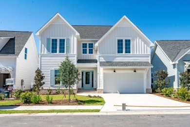 Discover refined coastal living in this thoughtfully designed on Origins Golf Club in Florida - for sale on GolfHomes.com, golf home, golf lot