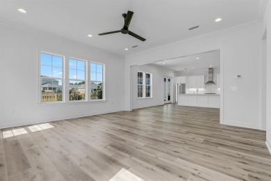 Discover refined coastal living in this thoughtfully designed on Origins Golf Club in Florida - for sale on GolfHomes.com, golf home, golf lot