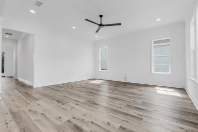 Discover refined coastal living in this thoughtfully designed on Origins Golf Club in Florida - for sale on GolfHomes.com, golf home, golf lot