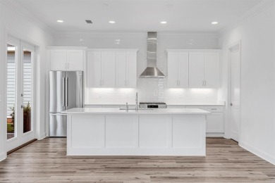 Discover refined coastal living in this thoughtfully designed on Origins Golf Club in Florida - for sale on GolfHomes.com, golf home, golf lot
