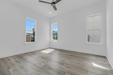 Discover refined coastal living in this thoughtfully designed on Origins Golf Club in Florida - for sale on GolfHomes.com, golf home, golf lot
