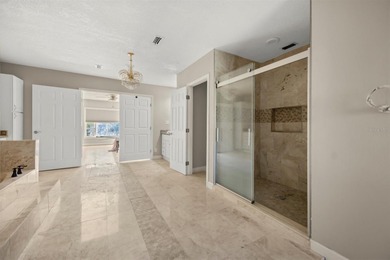 This home is located in one of Orlando's most well-known on Arnold Palmers Bay Hill Club and Lodge  in Florida - for sale on GolfHomes.com, golf home, golf lot