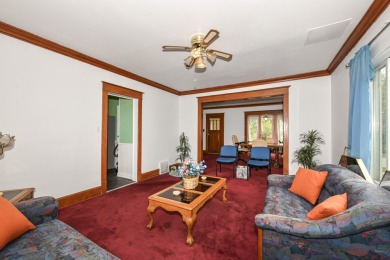 Many updates to this bungalow located across the street from a on Washington Park Golf Course in Wisconsin - for sale on GolfHomes.com, golf home, golf lot