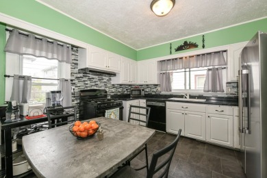 Many updates to this bungalow located across the street from a on Washington Park Golf Course in Wisconsin - for sale on GolfHomes.com, golf home, golf lot