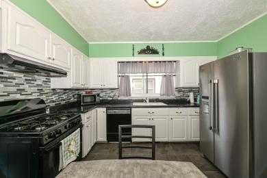 Many updates to this bungalow located across the street from a on Washington Park Golf Course in Wisconsin - for sale on GolfHomes.com, golf home, golf lot