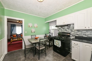 Many updates to this bungalow located across the street from a on Washington Park Golf Course in Wisconsin - for sale on GolfHomes.com, golf home, golf lot