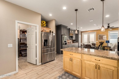 Stunning 2-bed plus den home built in 2017 featuring a on Sunland Springs Golf Course  in Arizona - for sale on GolfHomes.com, golf home, golf lot