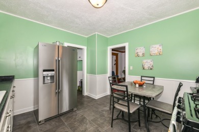 Many updates to this bungalow located across the street from a on Washington Park Golf Course in Wisconsin - for sale on GolfHomes.com, golf home, golf lot