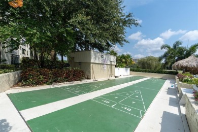 Welcome to your new resort lifestyle. This lavish two-bedroom on Cove Cay Country Club in Florida - for sale on GolfHomes.com, golf home, golf lot