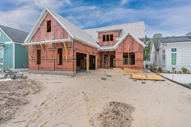 Step into refined coastal luxury with the Suffolk II, an on Origins Golf Club in Florida - for sale on GolfHomes.com, golf home, golf lot